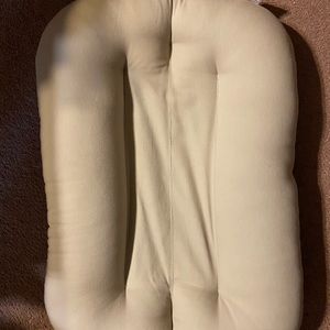 Infant snuggle me sleeper.